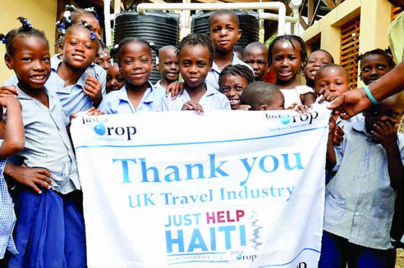 Haiti_Hinche children with banner copy.jpg