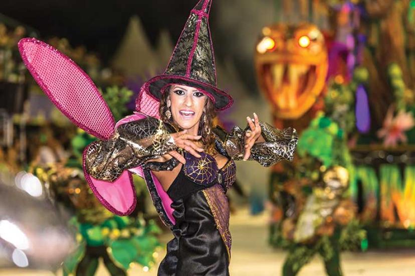 Latin lady in witch hat