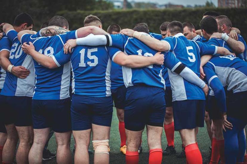 Rugby team huddle