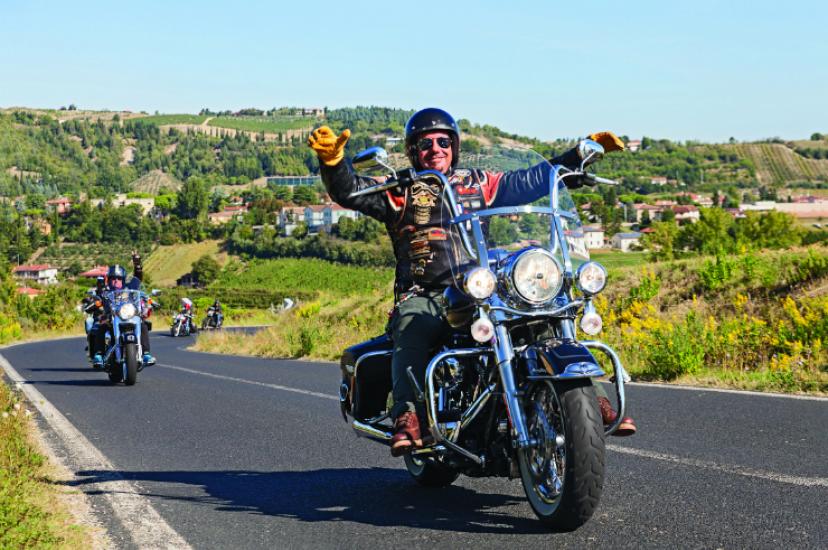 Happy Driver Riding Harley Dav Affordable Car Hire smaller.jpg