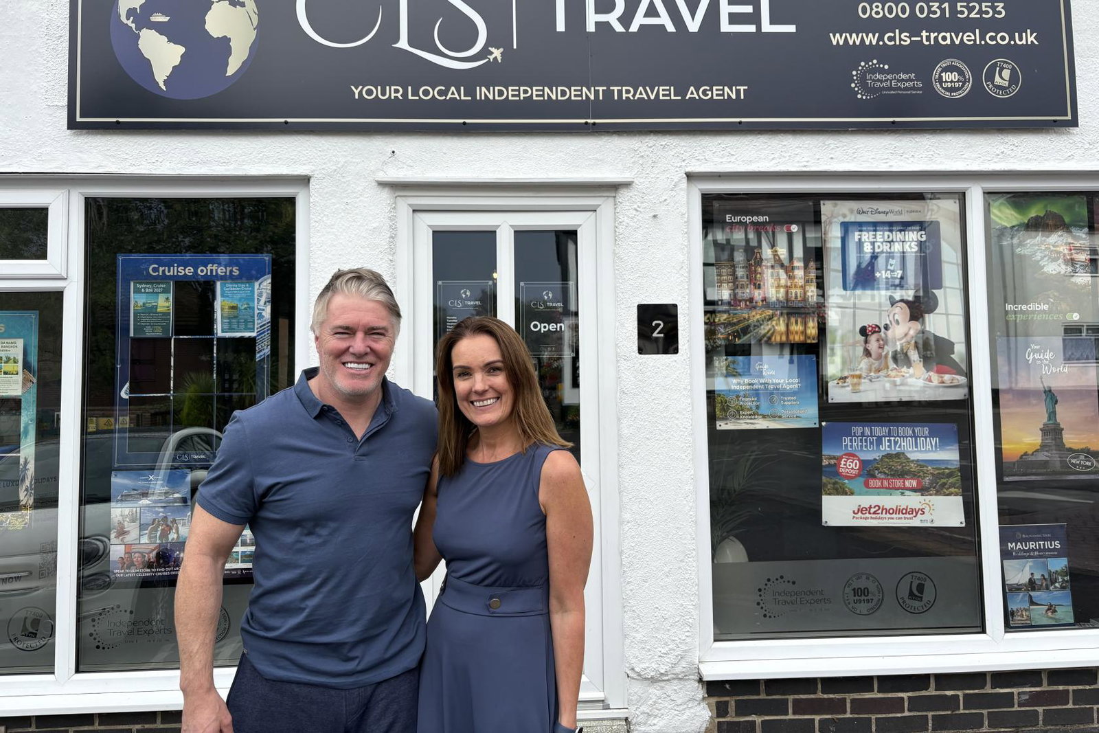Rod and Clare Stege outside the first CLS Travel shop in Littleover 