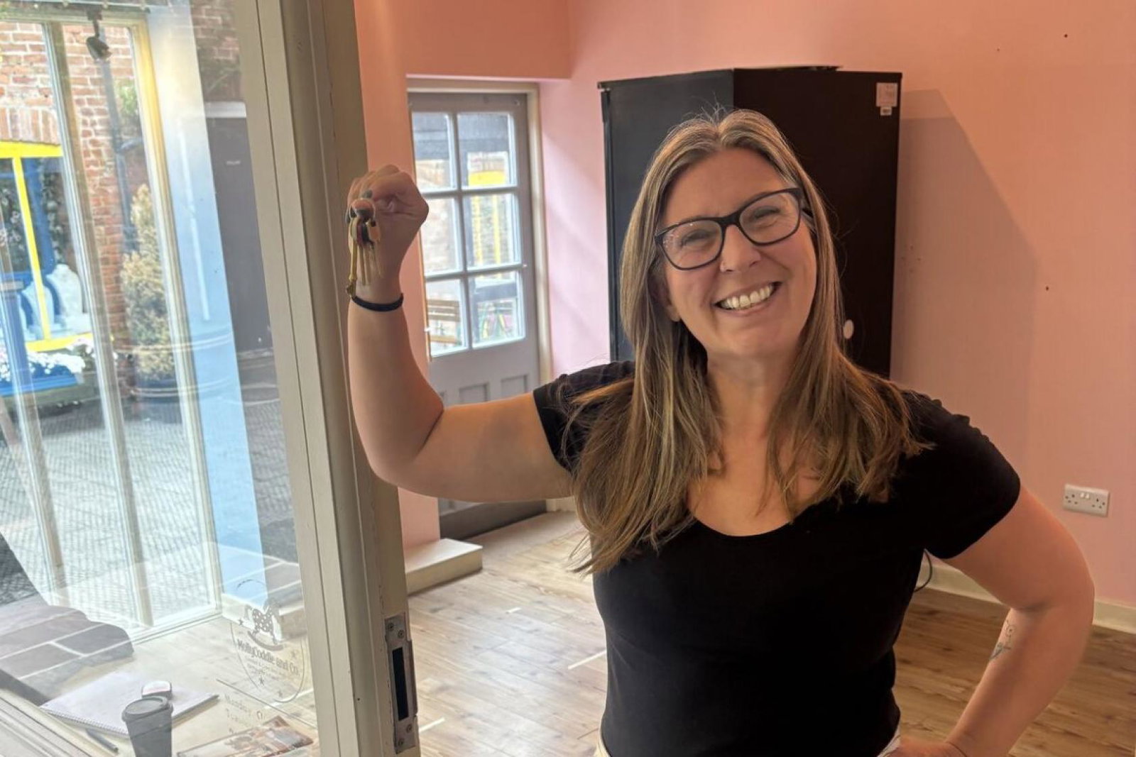 Kerry Gallagher picks up the keys to Silver Travel Advisor's second premises