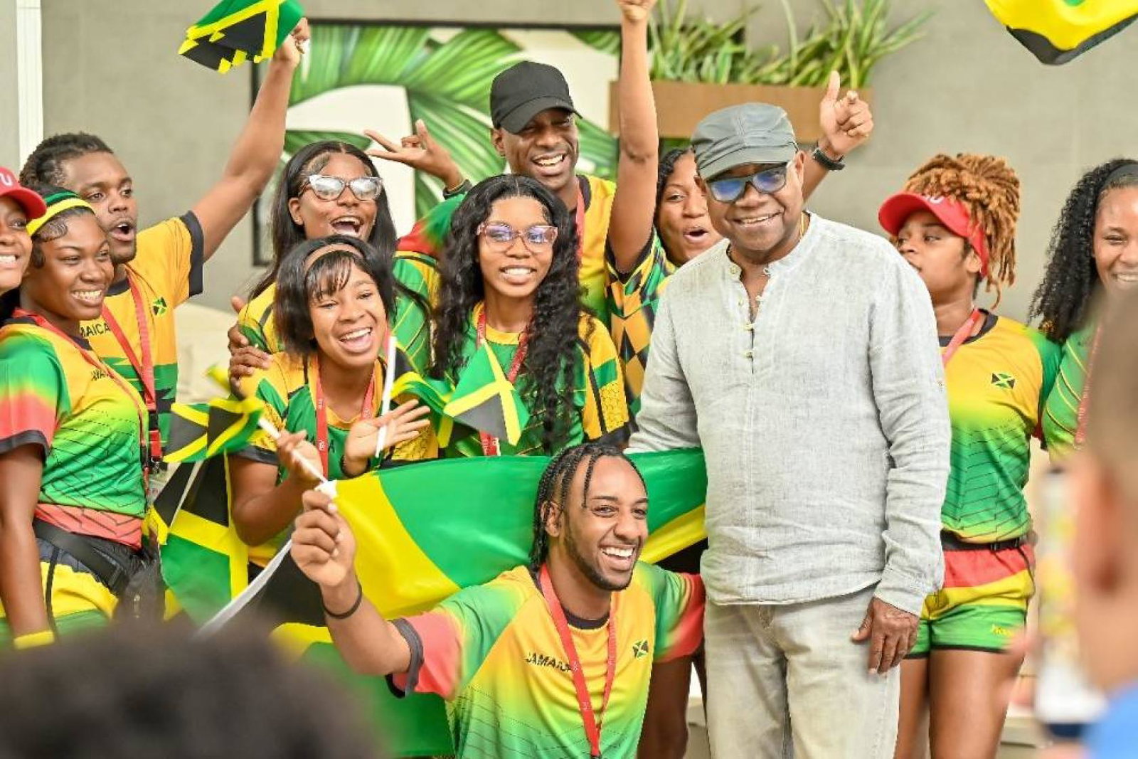 Edmund Bartlett, Jamaica's Minister of Tourism, celebrating with RIU employees
