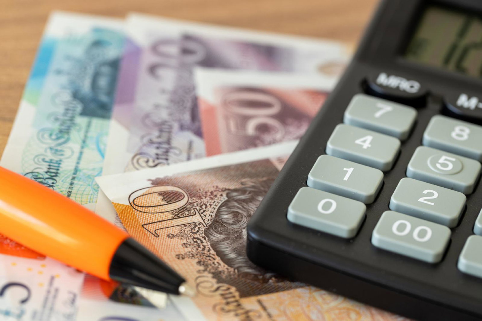 Money next to a calculator