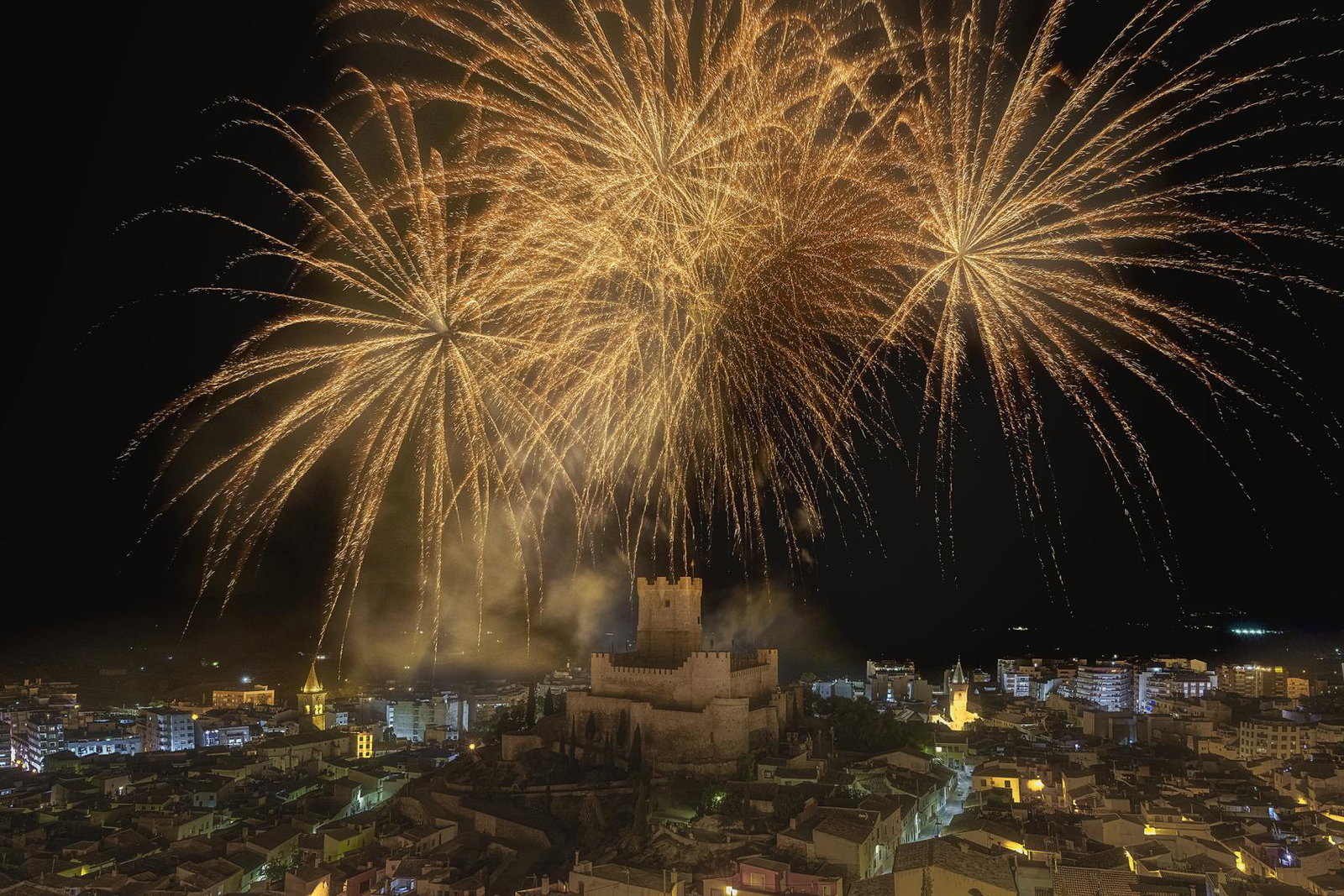 Fireworks over castle in Villena, Spain