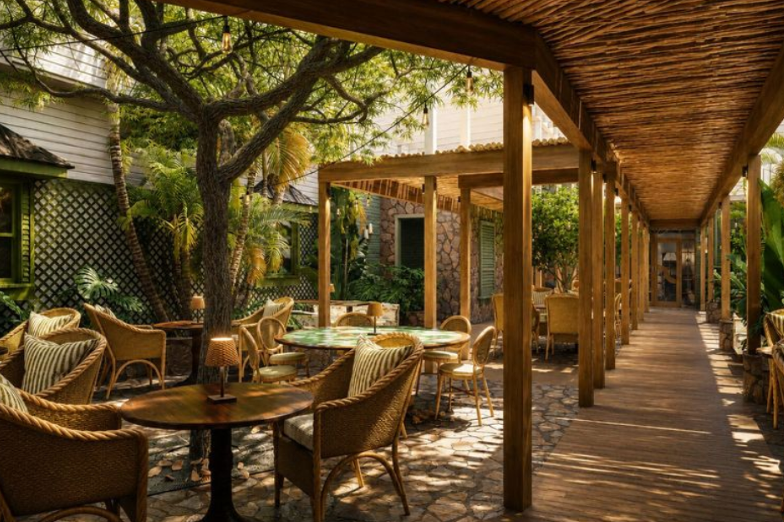 A restaurant inspired by a Jamaican home, with wooden accents and surrounded by greenery