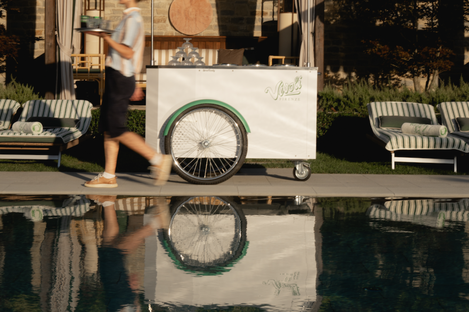 Image of vivoli ice-cream cart by outdoor pool