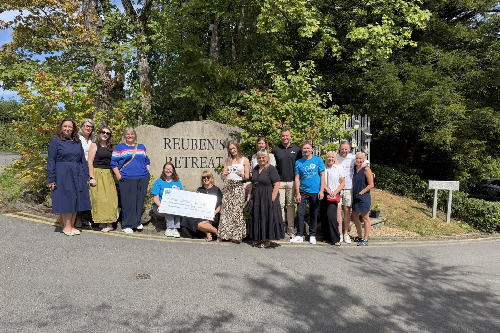 TIPTO Team Present the Cheque to Reuben's Retreat