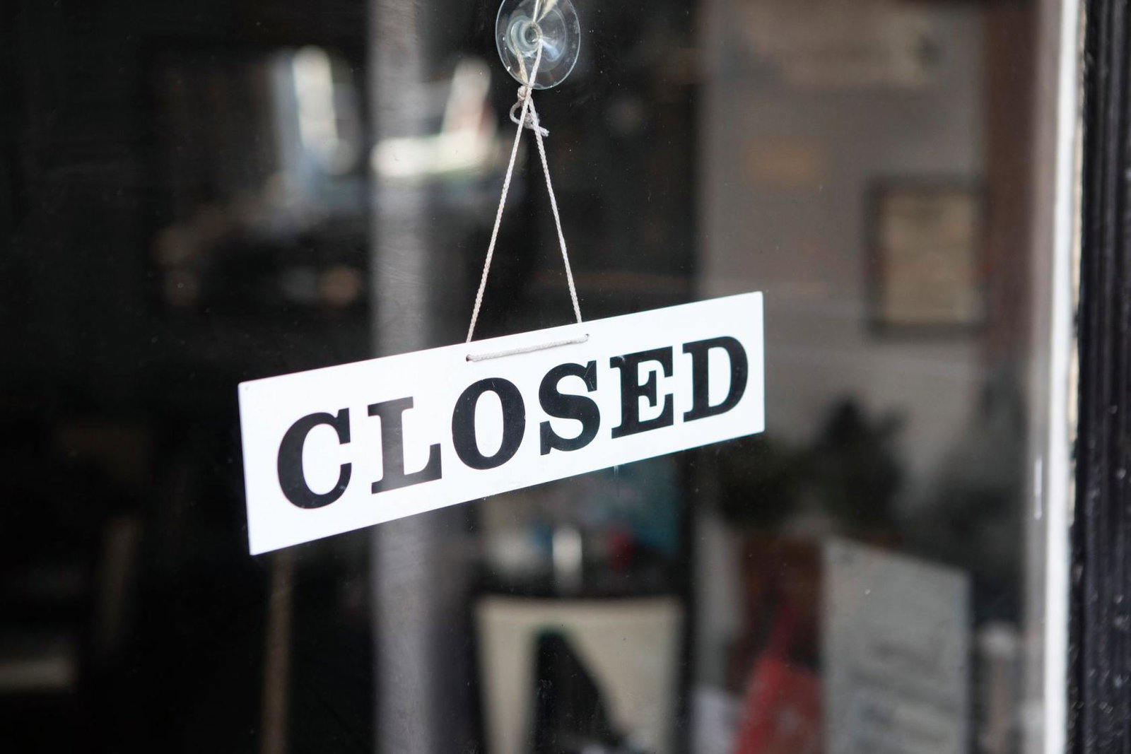 Shop closed sign in window