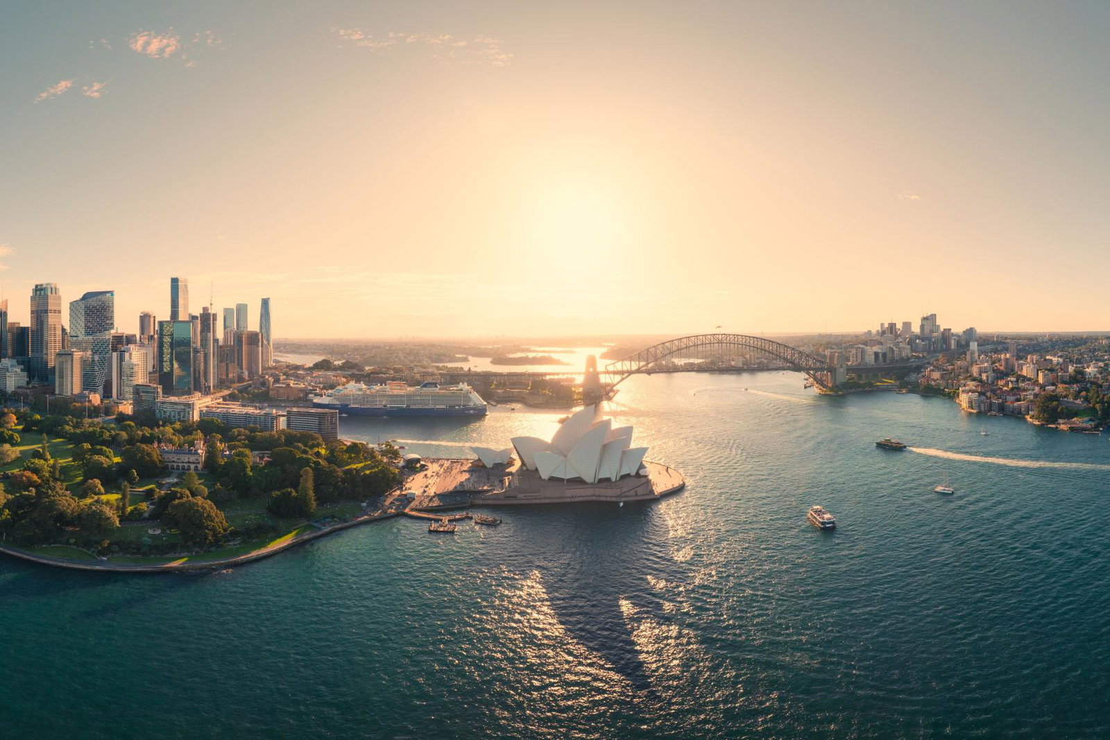 Port Jackson, a famous natural harbour surrounding iconic landmarks including the Sydney Opera House and the Sydney Harbour Bridge