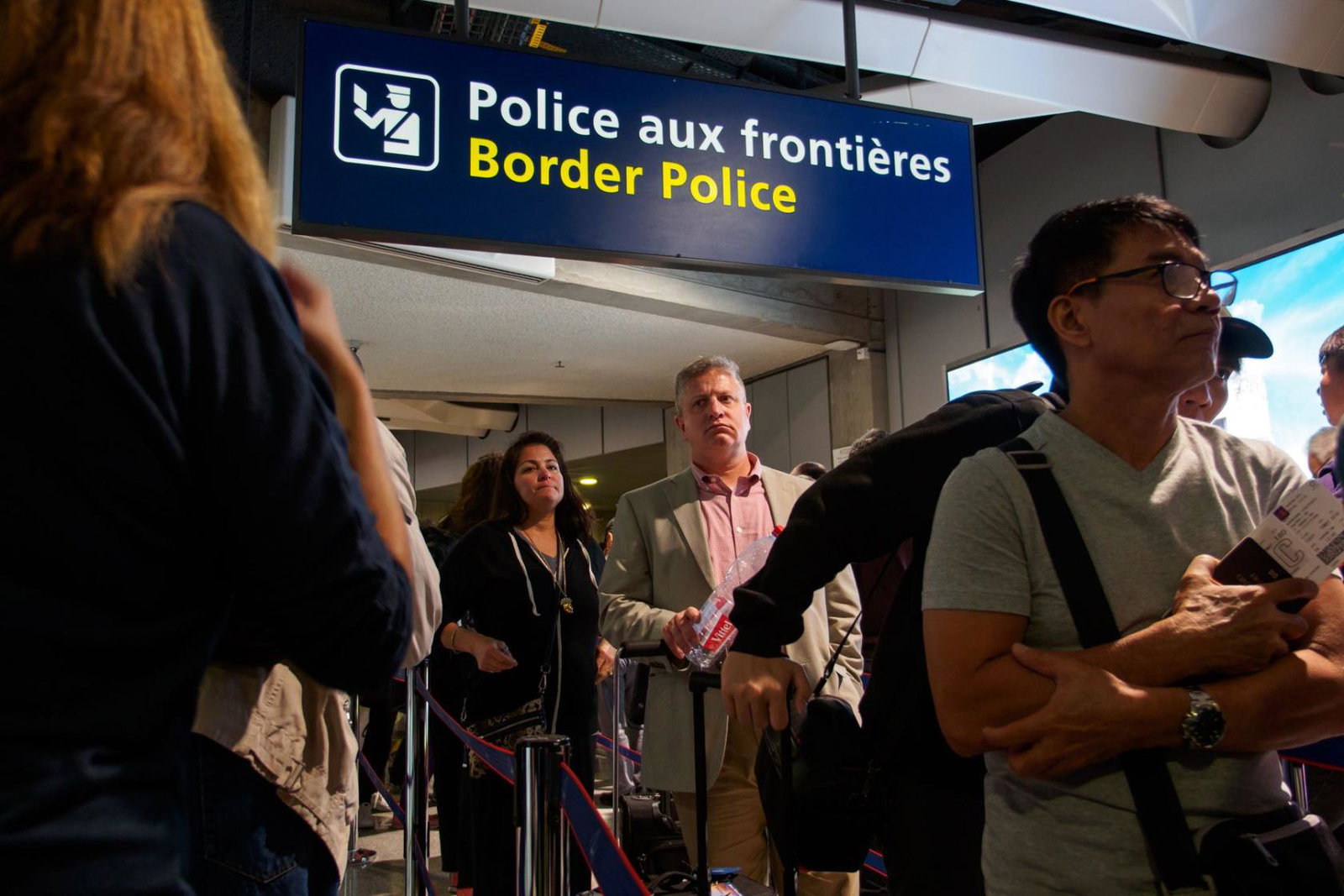 Passenger queue to clear border control at a European airport