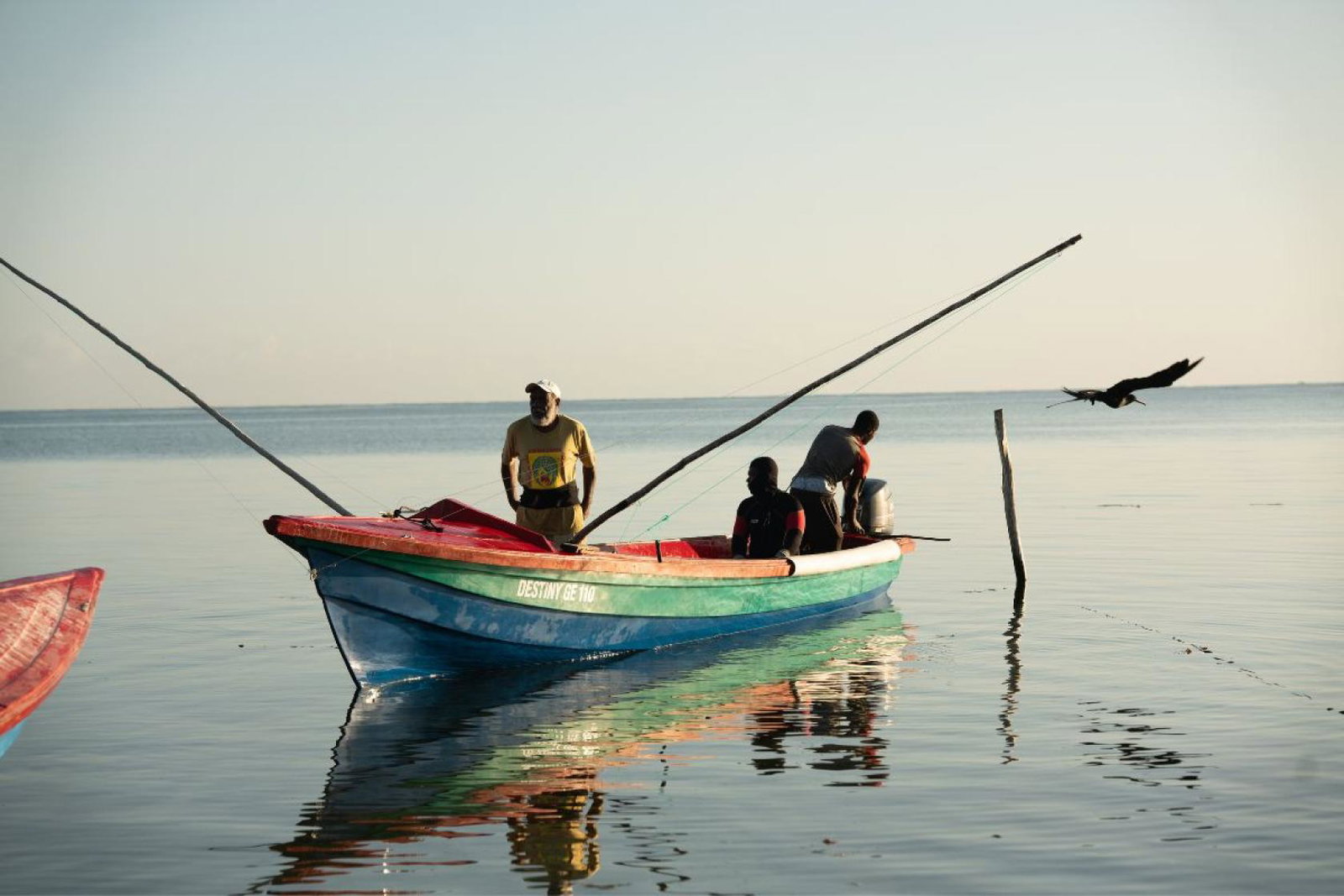 People on a small fishing boat 