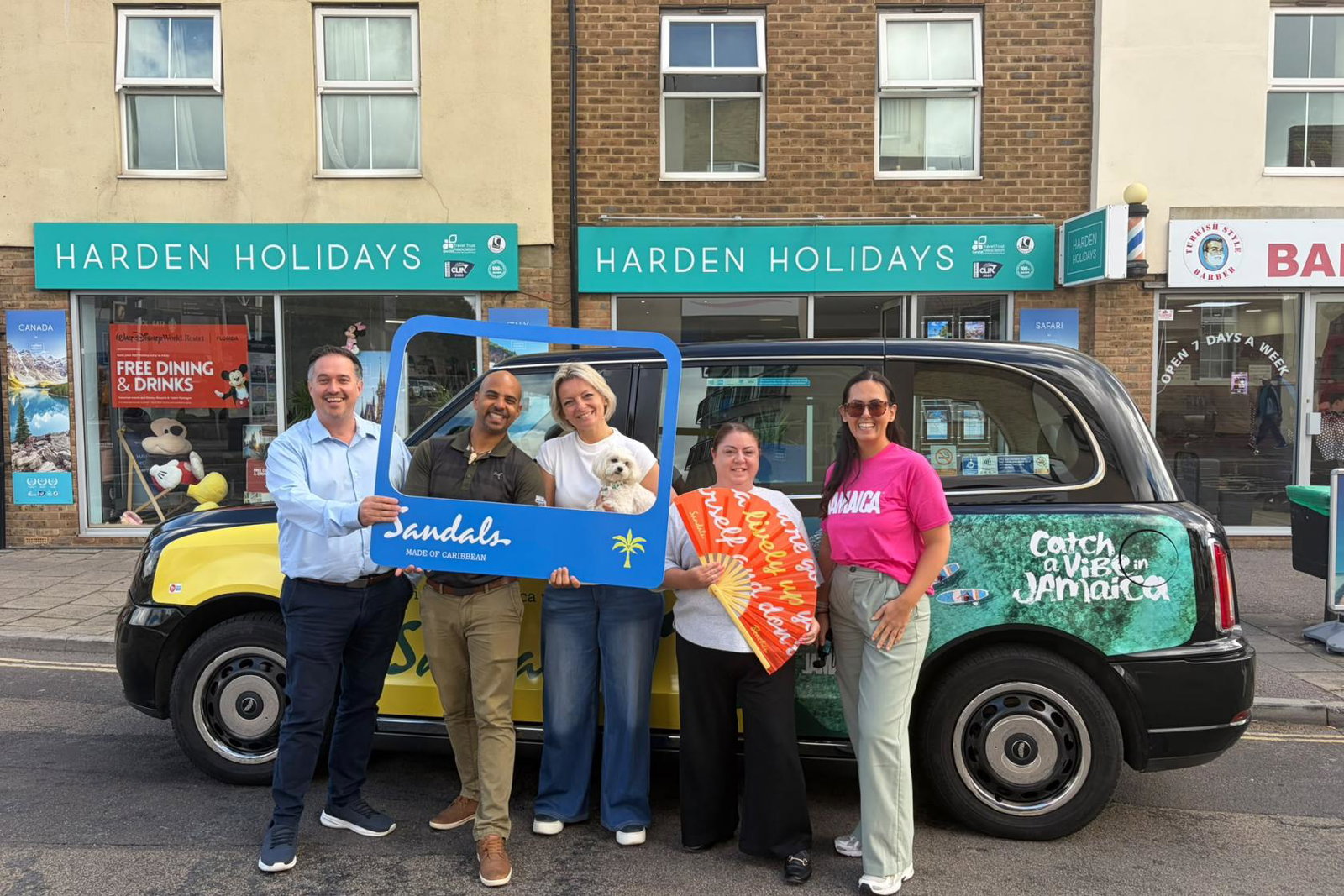 Jamaica and Sandals & Beaches Resorts Taxi Team outside Harden Holidays.