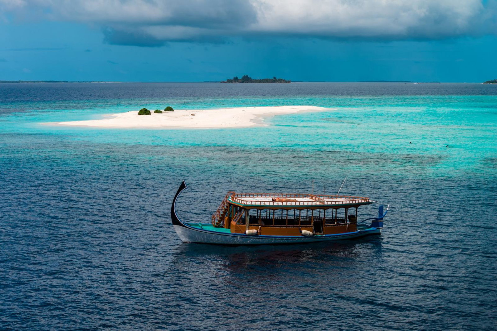 A traditional Maldivian Dhoni boat at sea