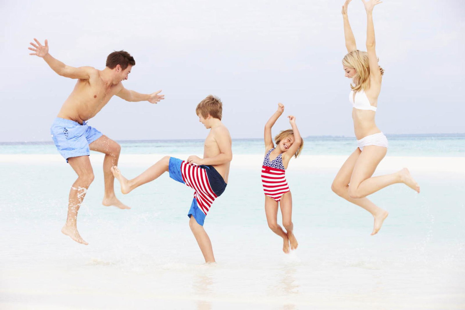 Family holiday - beach (stock)