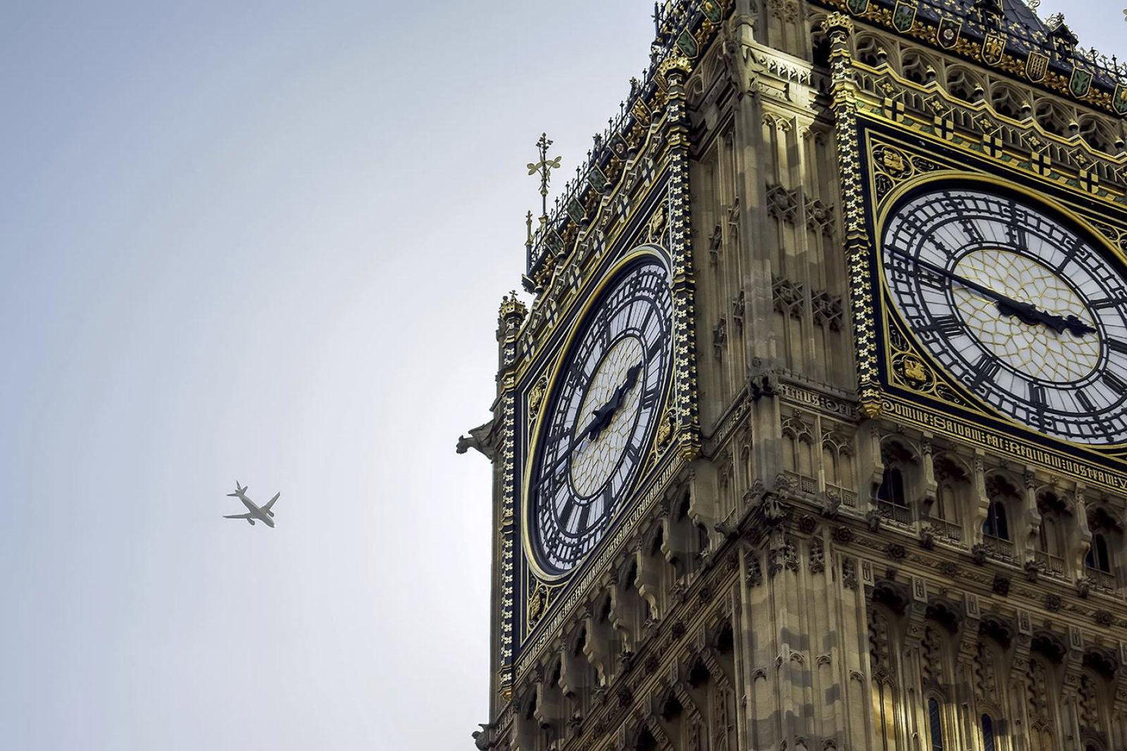 Big Ben with aircraft (stock)
