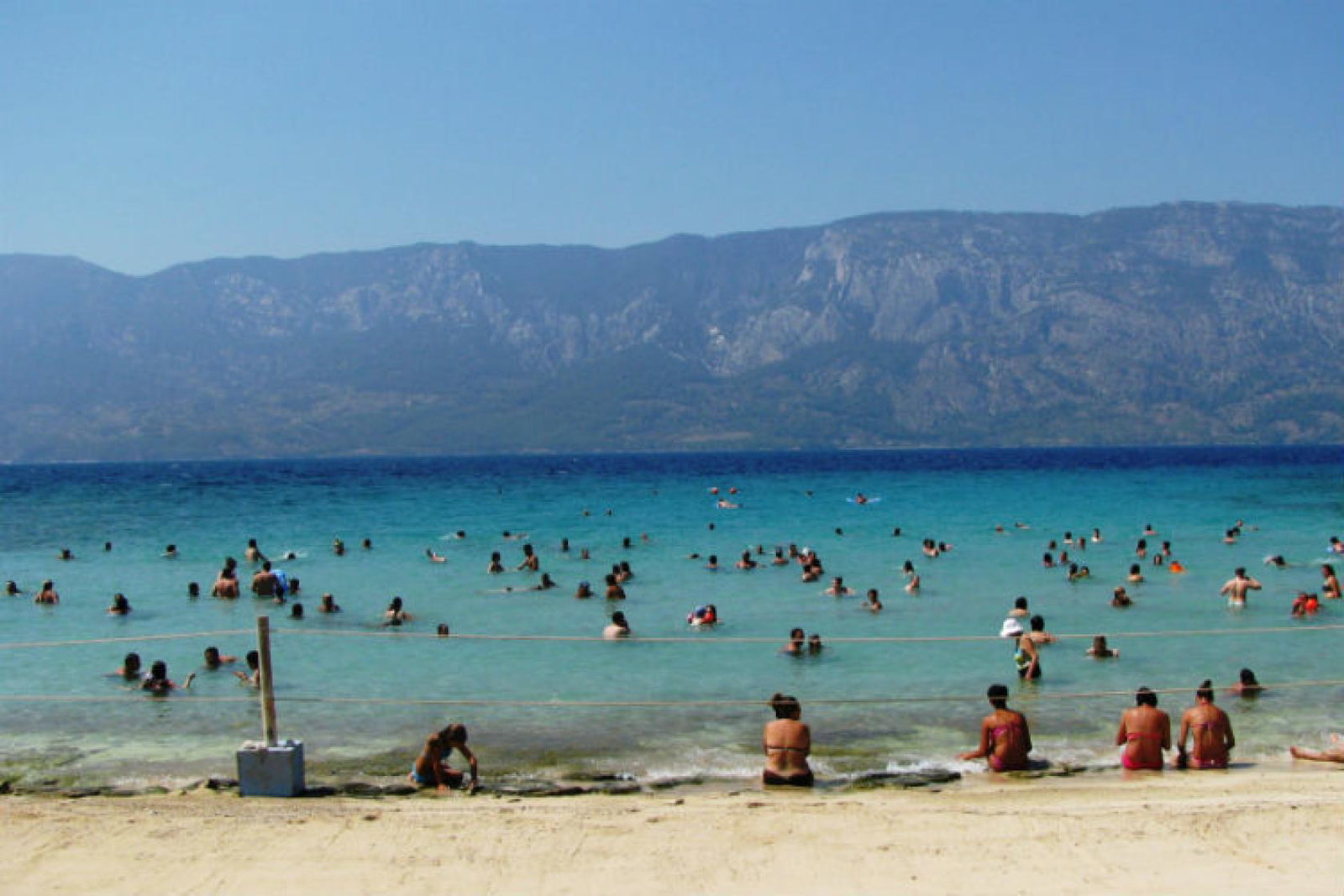 A group of tourists swimming in Sedir Island Cleopatra beach, near Marmaris, Turkey ThinkstockPhotos