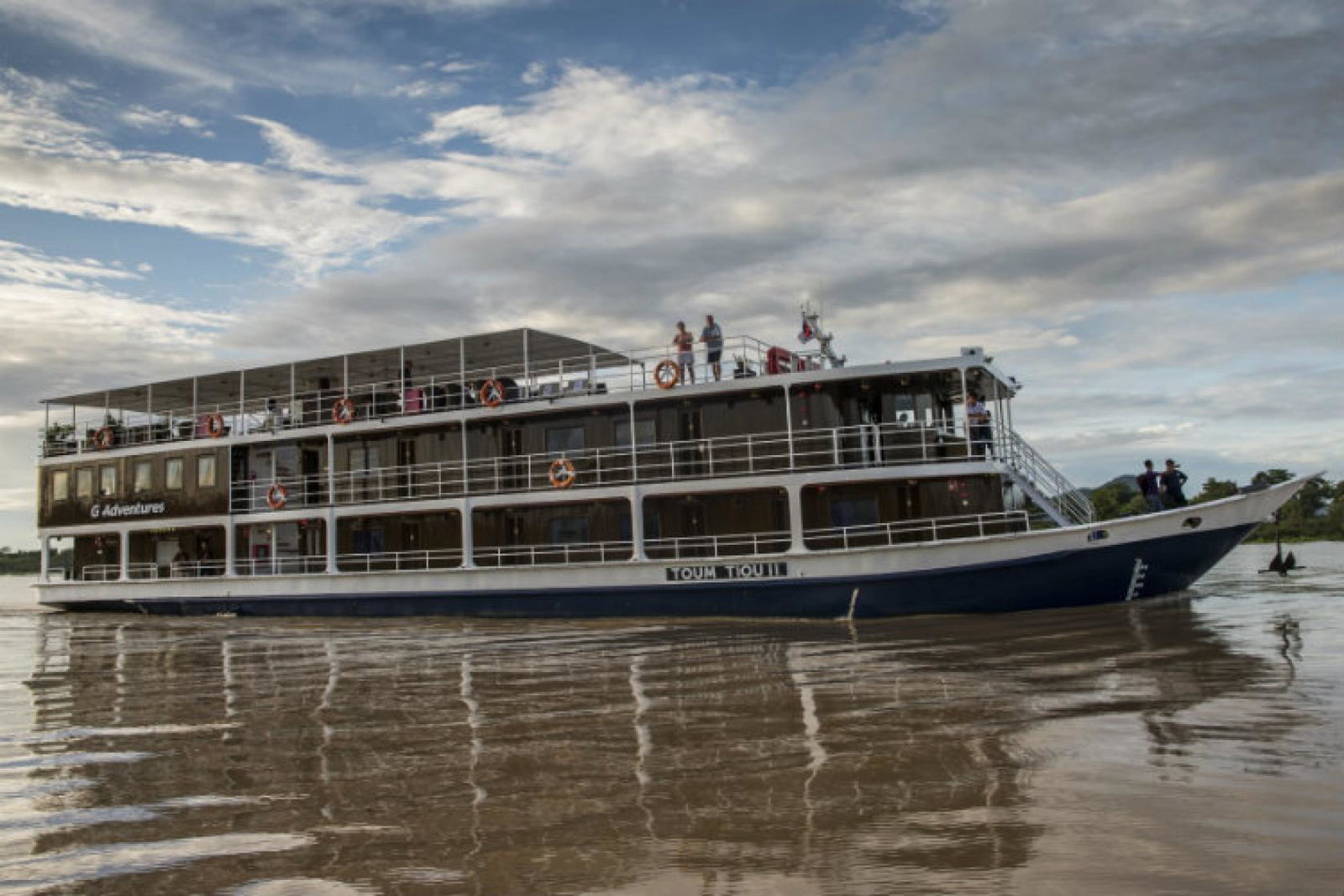 G Adventures ship in the Mekong