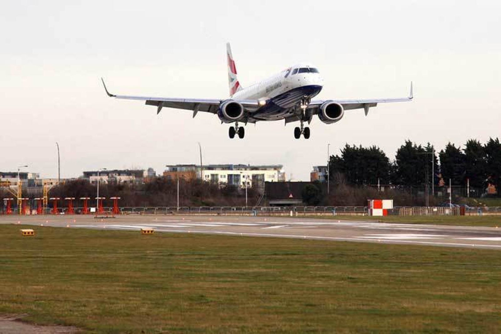 A British Airways jet arrives at London City airport