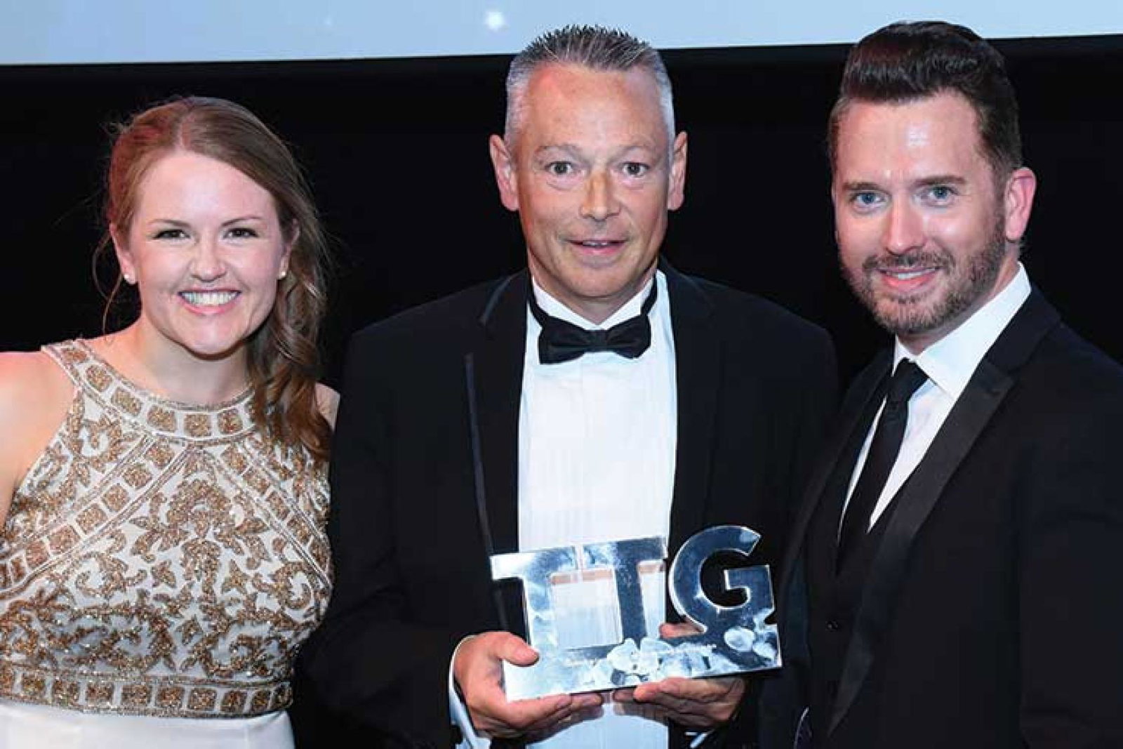 Miles Morgan receiving his TTG Outstanding Contribution award