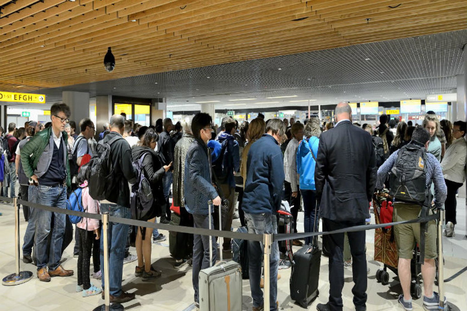 Airport queues have caused long delays and seen passengers miss flights