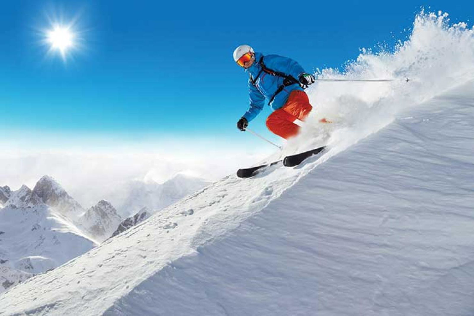 Downhill skier in the sun iStock-495114582
