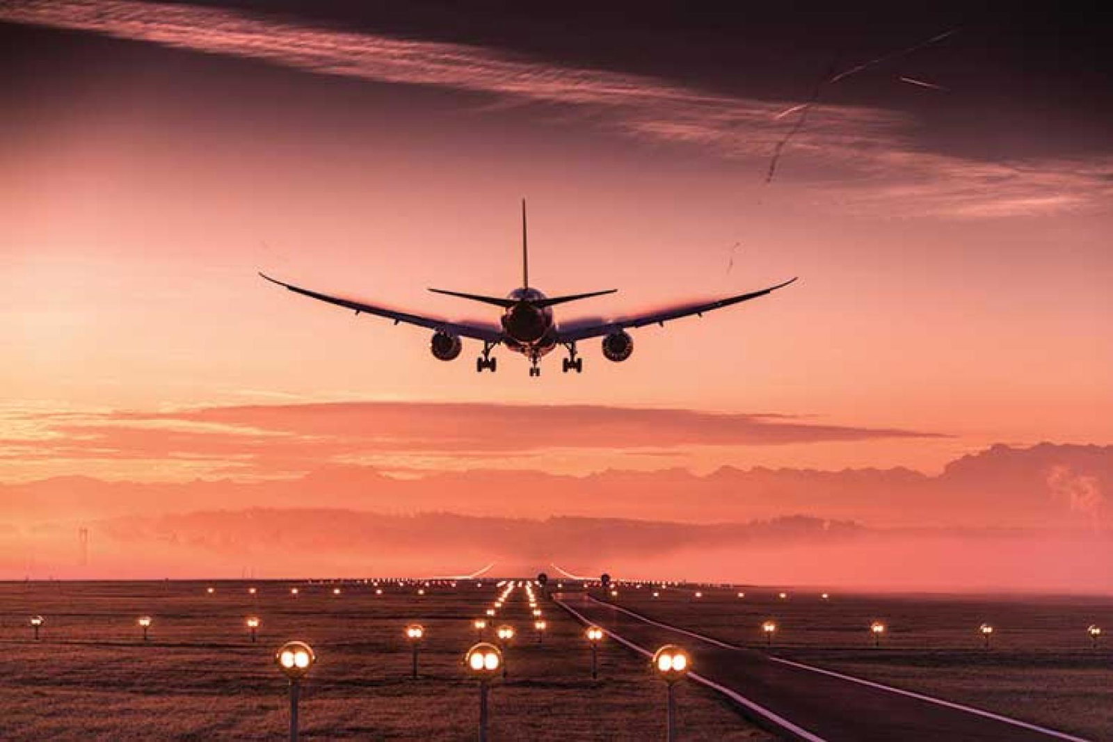 Jet airliner at sunset