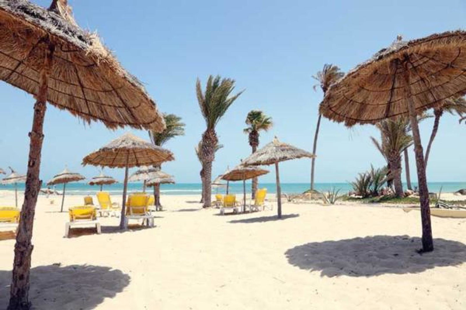 Tunisian beach, sun loungers and parasols