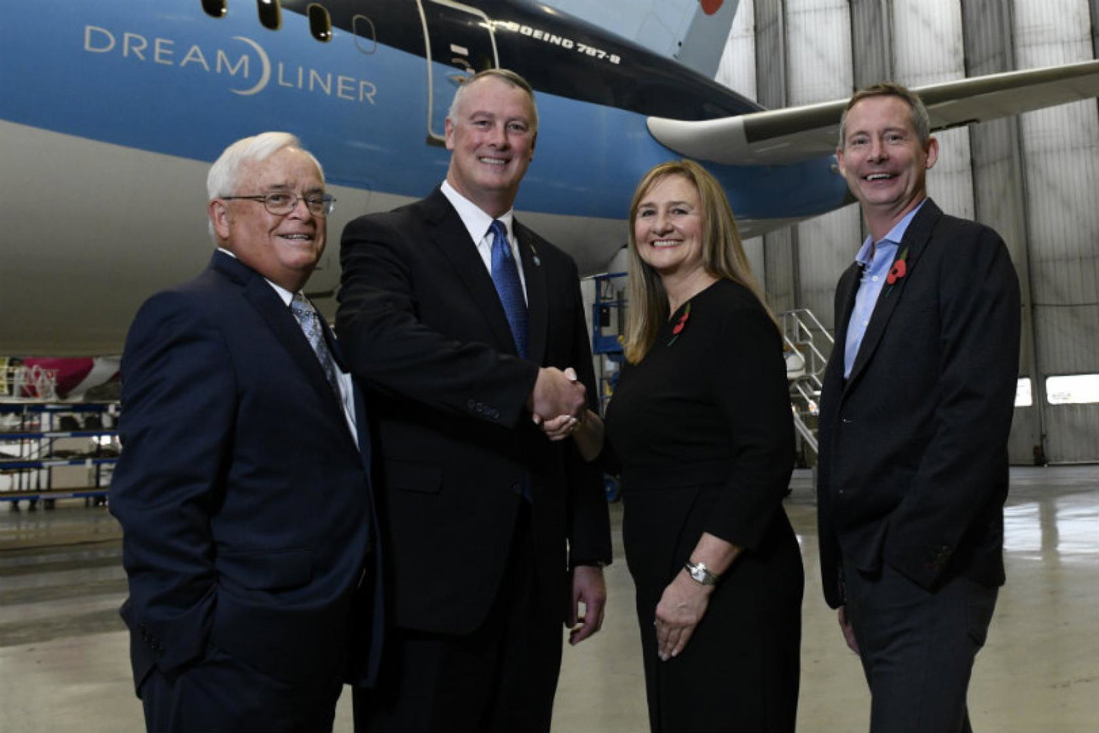 Andrew Flintham and Dawn Wilson from Tui, and Greg Donovan and Jack L. Ryals from the airport