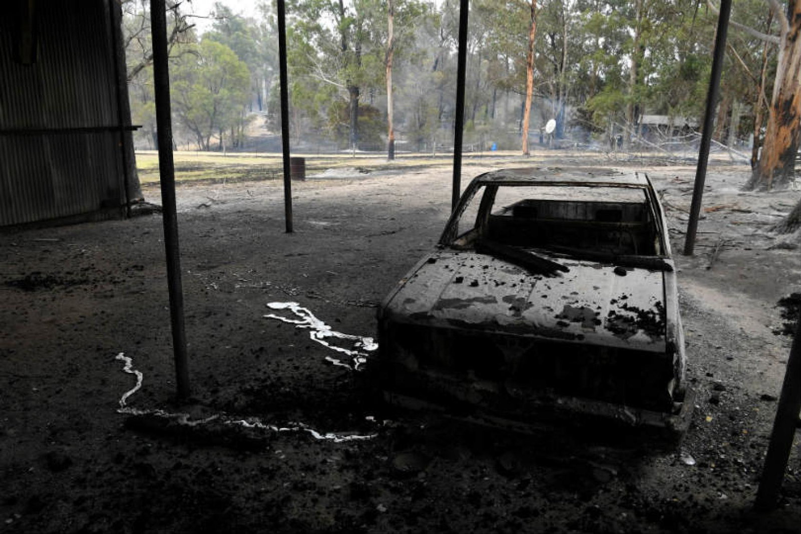 A burnt-out car after bushfires in Victoria, Australia. Picture: AAP Image/James Ross