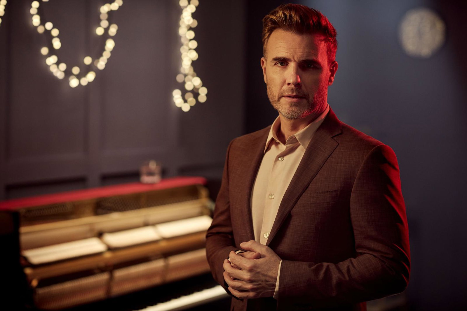 The singer is music director of Iona's 710 Club