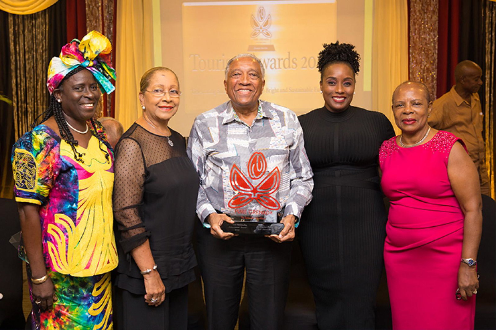 Sir Royston Hopkin pictured receiving an Outstanding Achievement Award in 2019