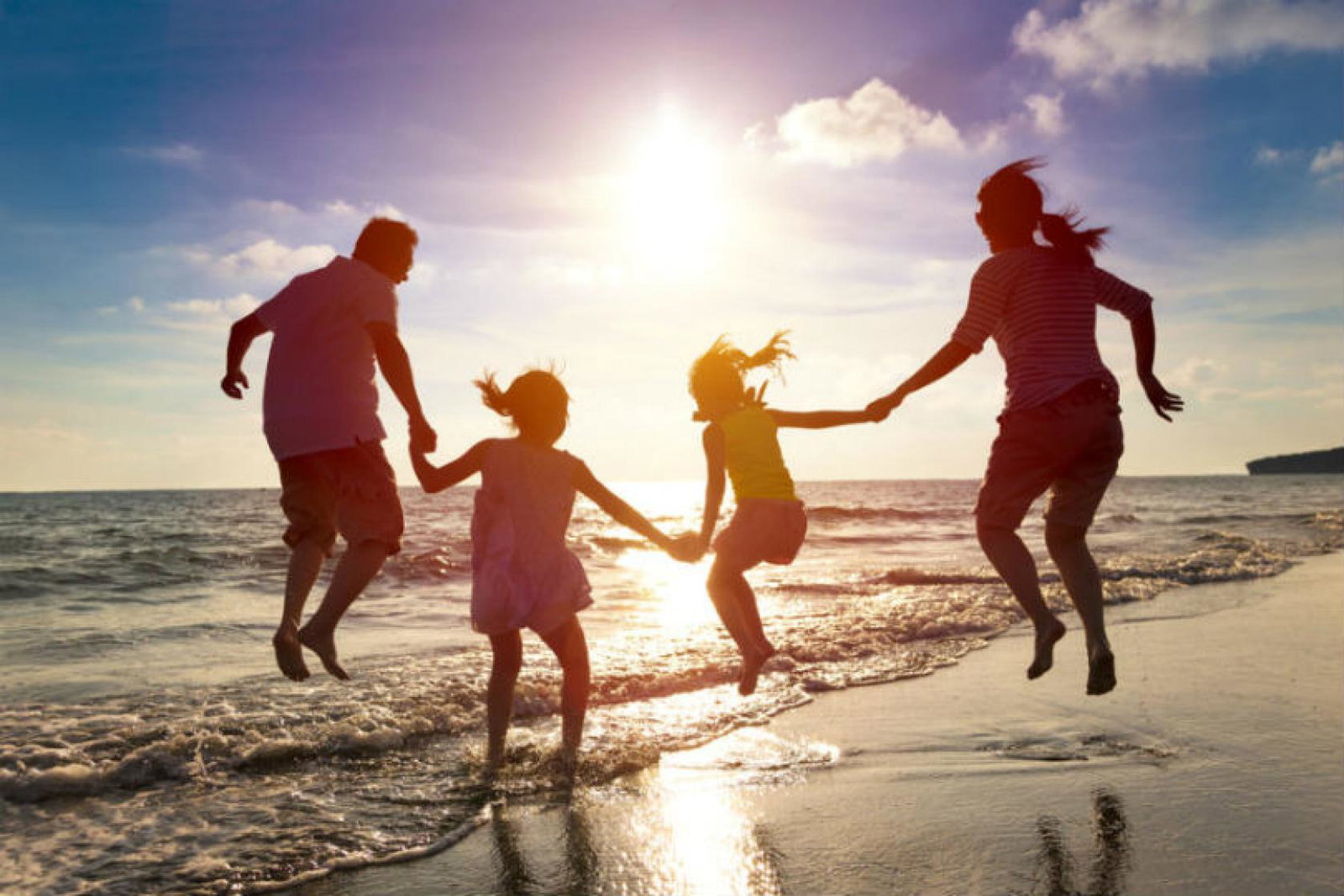 Family holiday, beach, parents, children, sunset