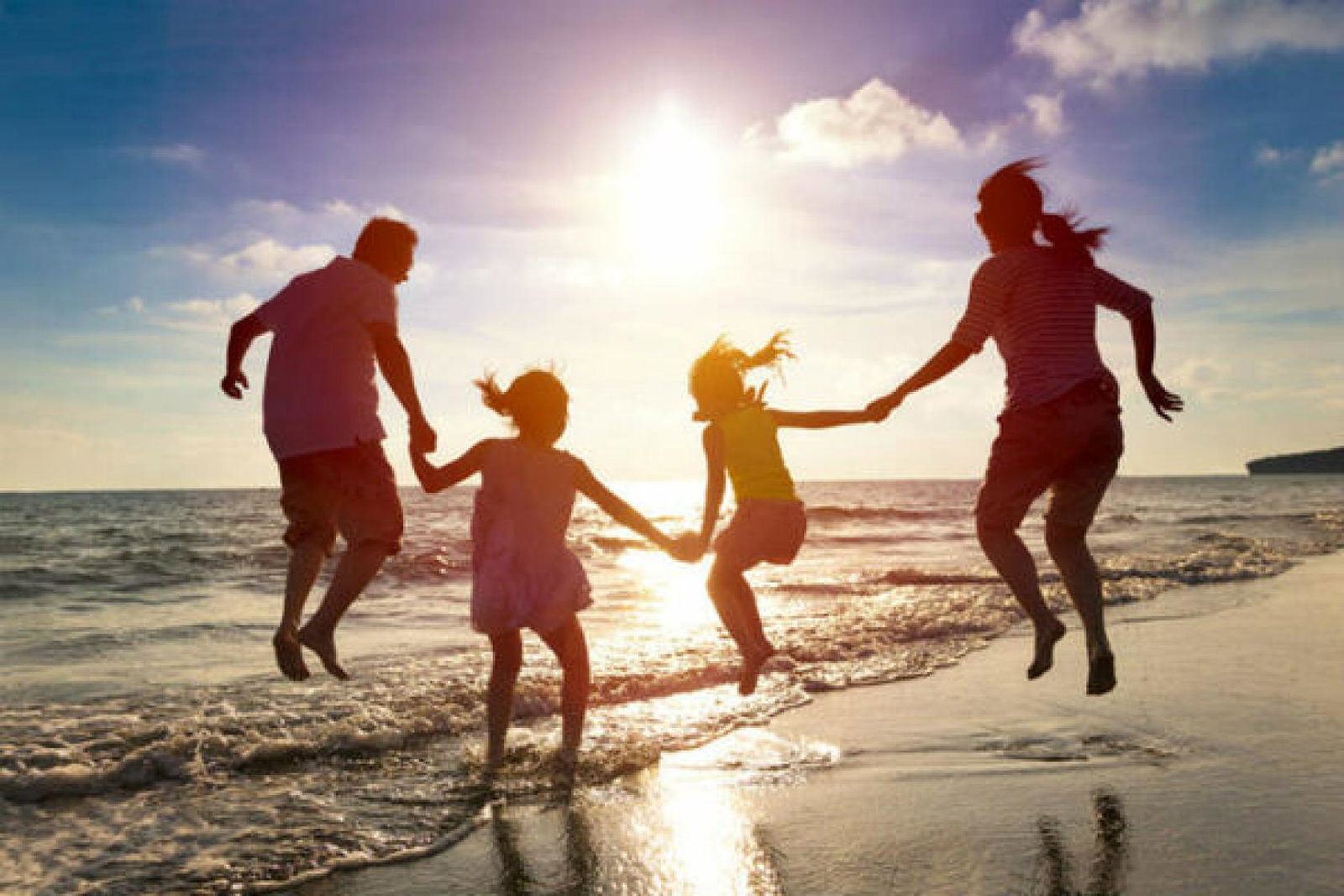 Family holiday, beach, parents, children, sunset