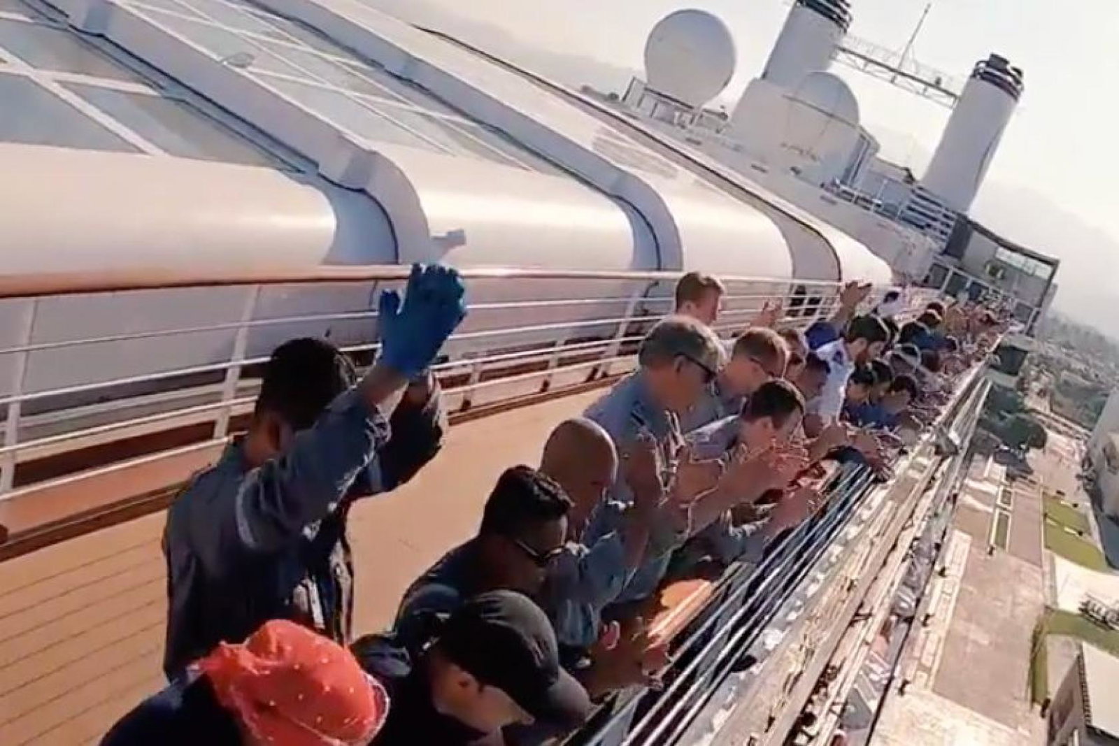 People applauding onboard the MS Rotterdam
