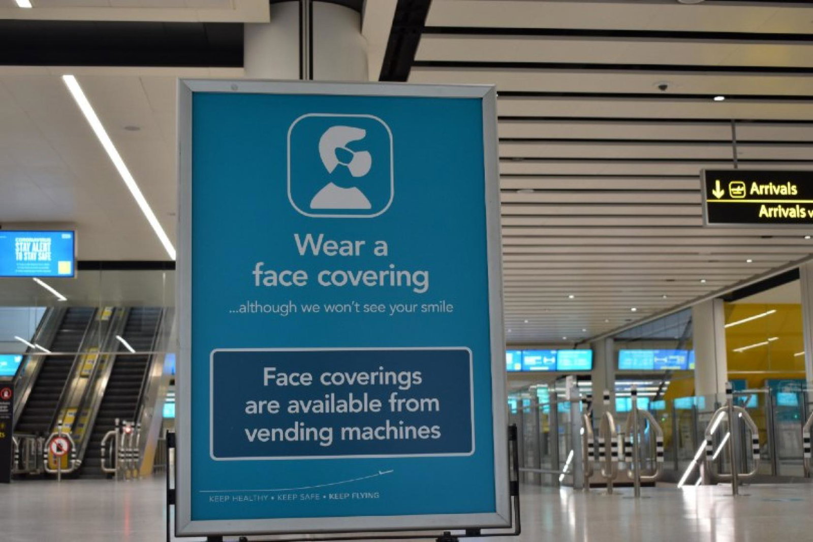 Face coverings look set to remain a feature of international travel for some time
