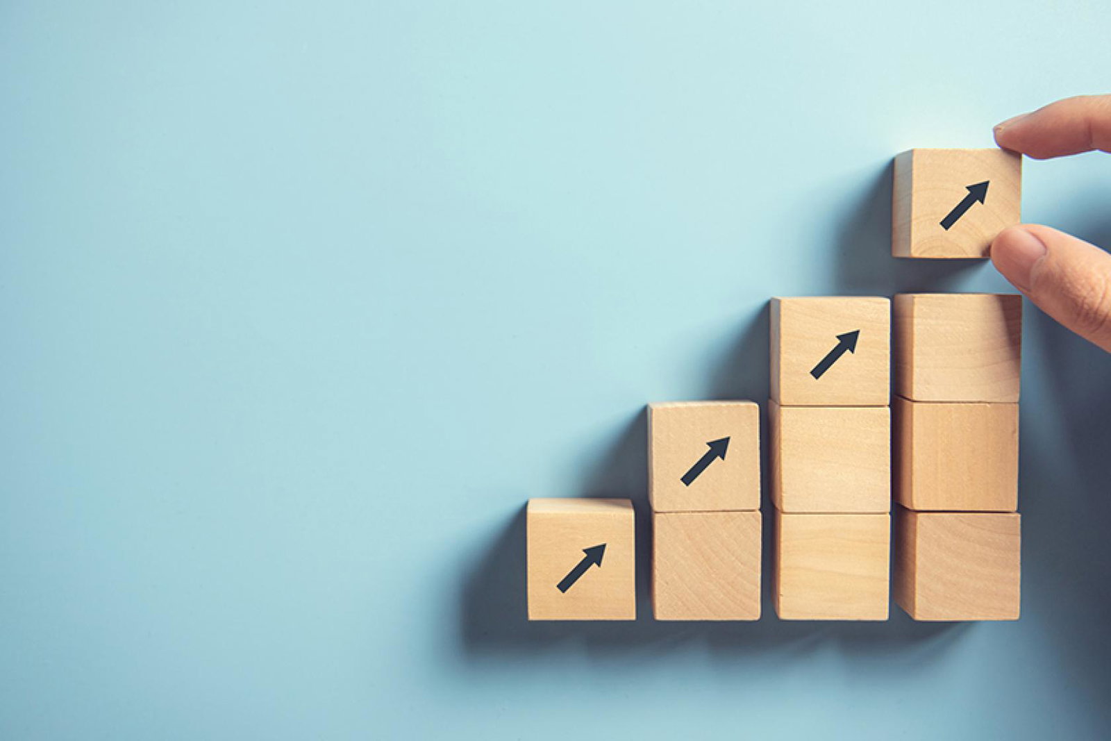 Building blocks with upward arrows on them