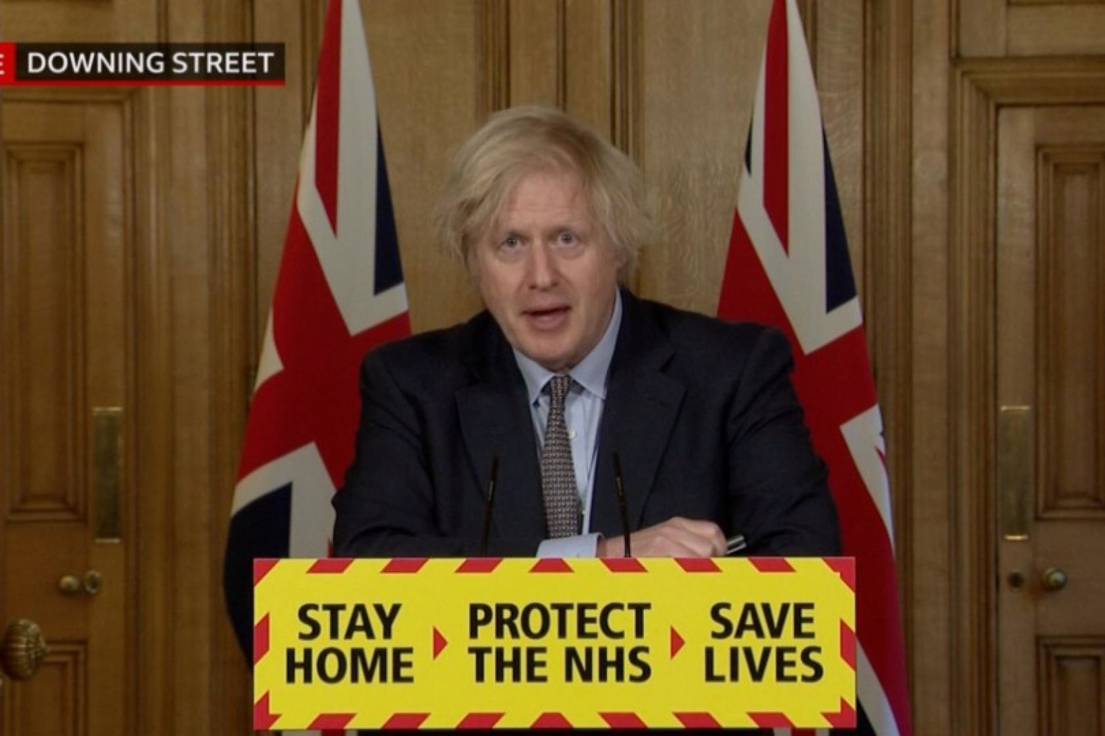 Johnson was asked why travellers stuck in red-listed countries can't self isolate at home rather than a hotel (Credit: BBC News)