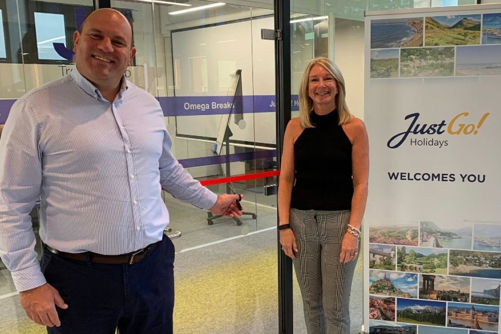 Chief executive Andy Freeth (left) and HR director Helen Moylan (right) officially open the second floor of the new office space