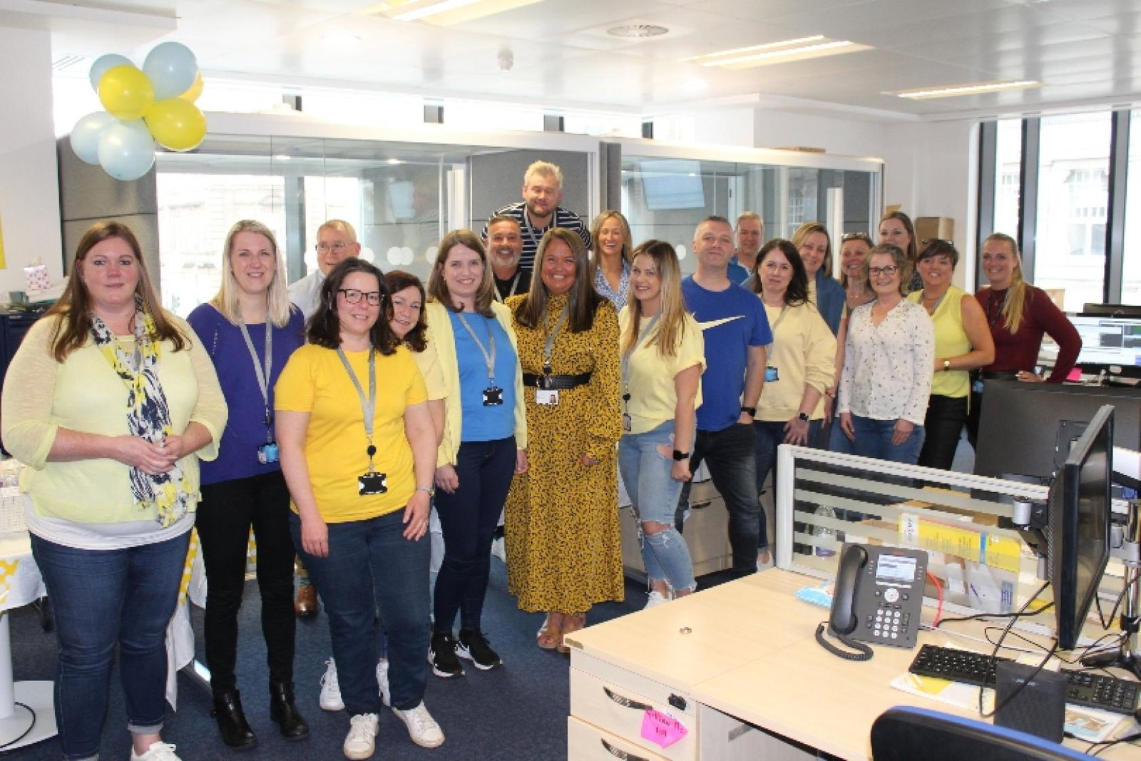 The firm encouraged staff to wear blue and yellow to show support for the country