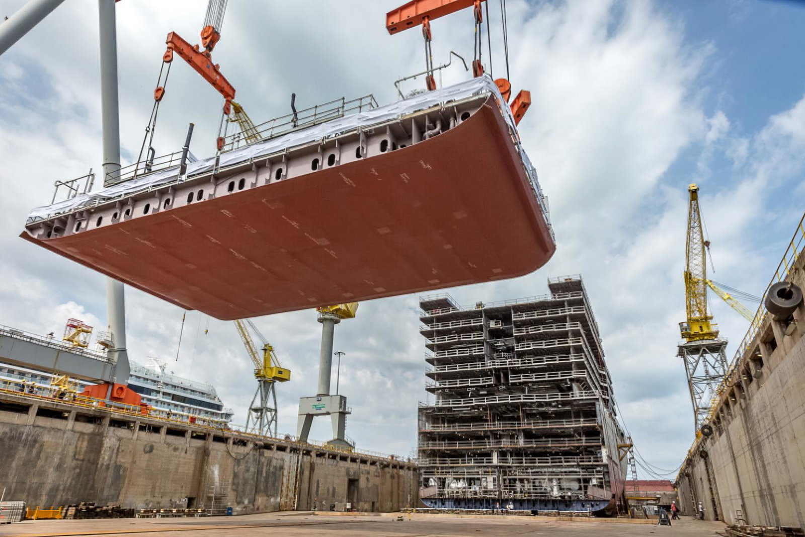 During the ceremony at the Fincantieri shipyard, the line's leadership team formally place one of the vessel’s building blocks