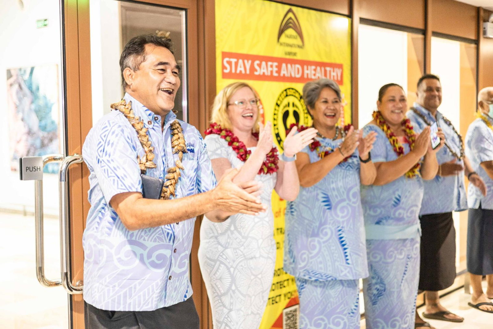 Samoa's minister of tourism greeted passengers on returning flights from Sydney and Brisbane (Image credit: Australia High Commission/Apia)