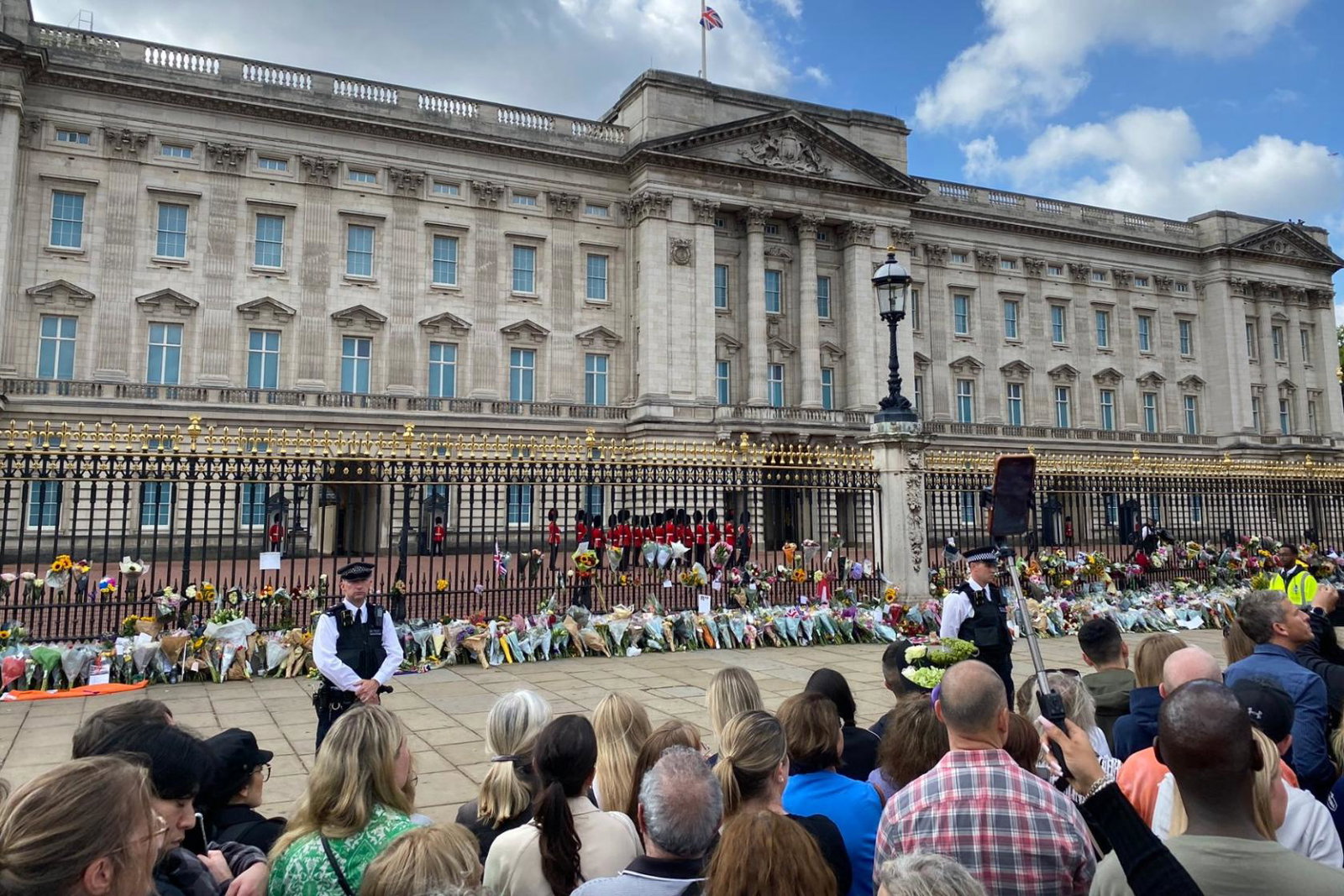 Thousands of people have flocked to Buckingham Palace following the Queen's death (credit: Phil Bloomfield)