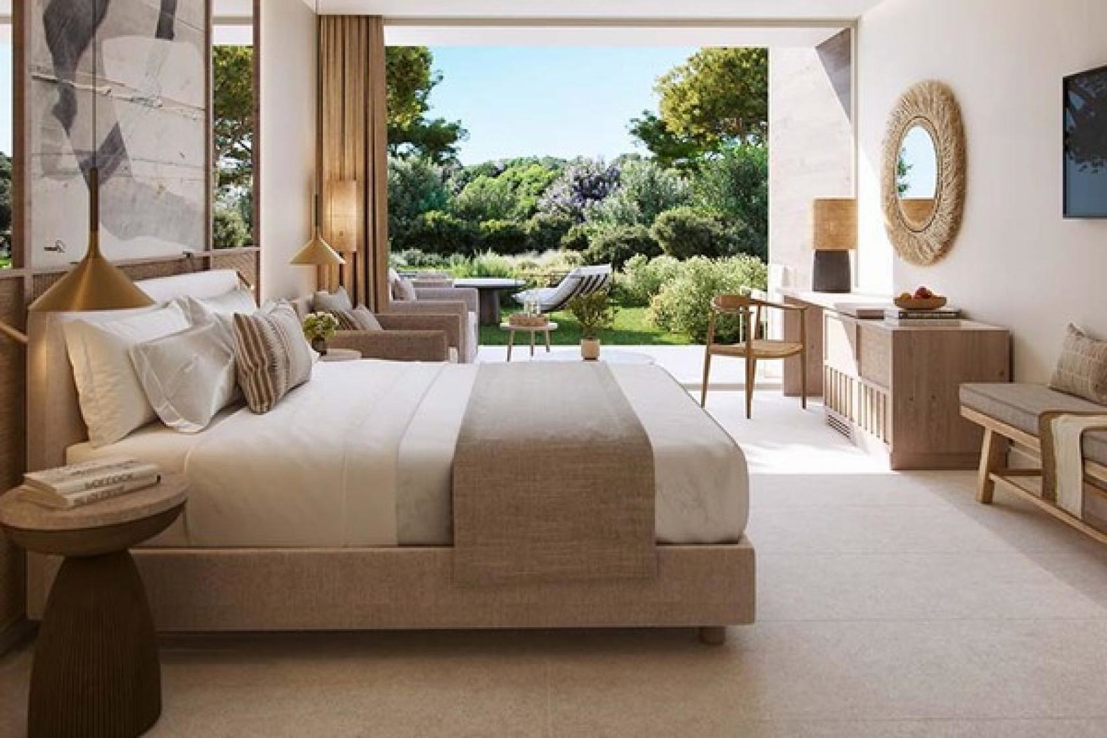 A family room with a private garden at the Ikos Porto Petro