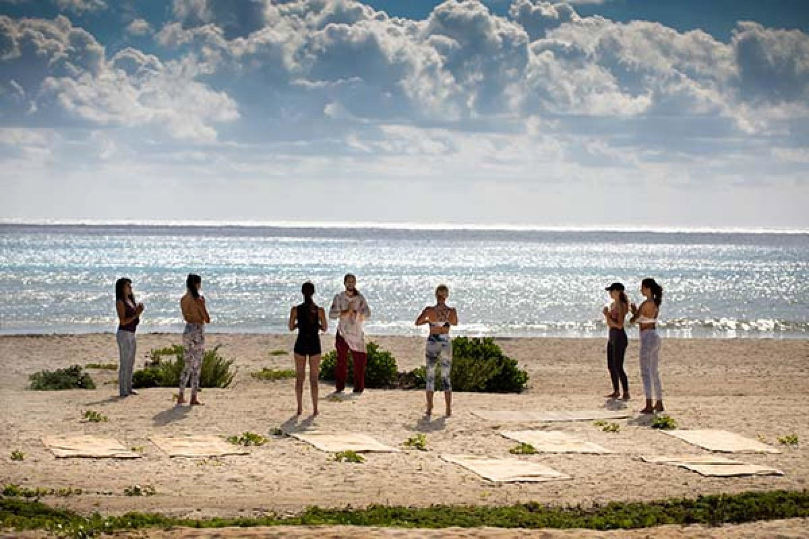 A beachside movement class at Palmaia, The House of AIA, which will host the second Synergy show