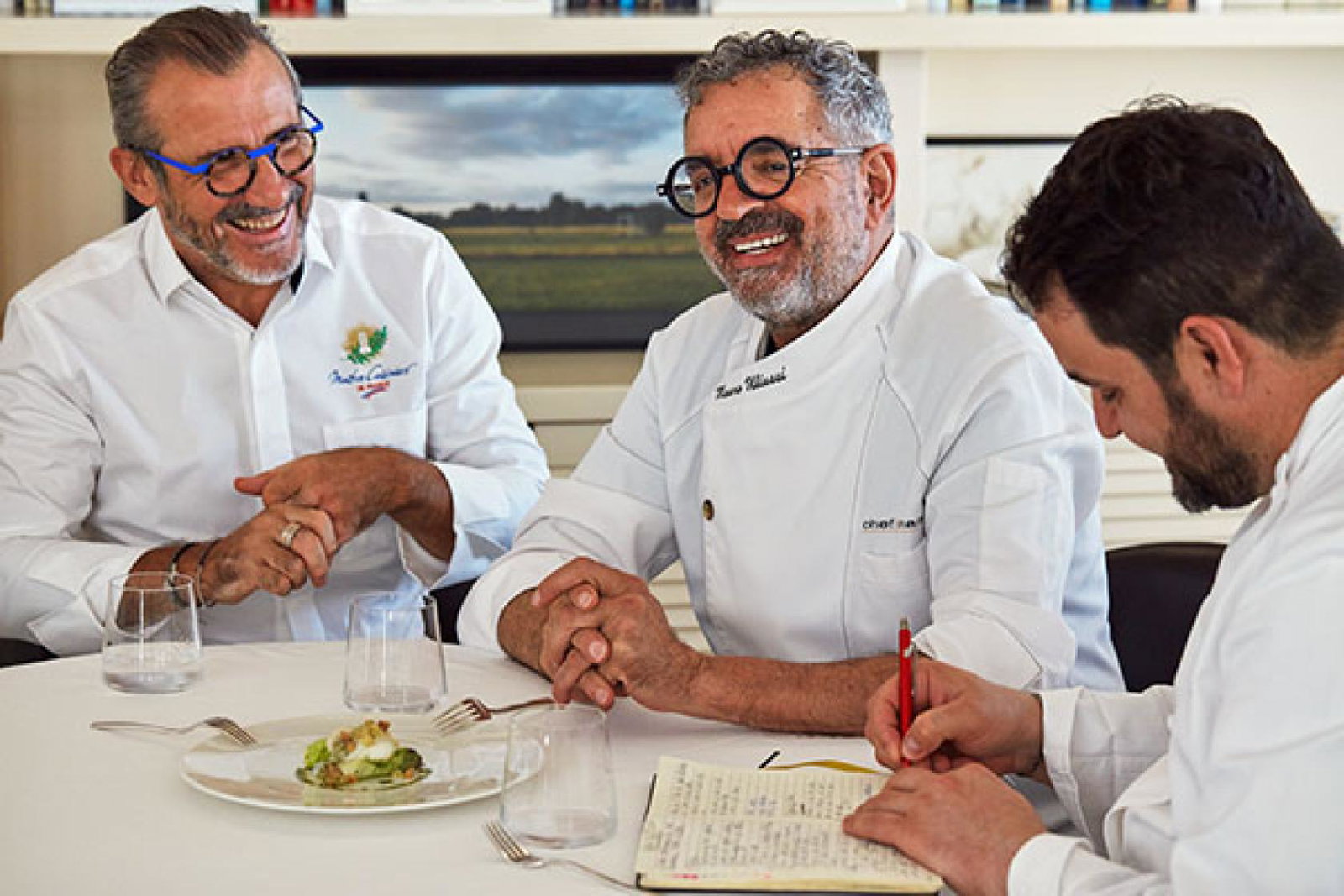 Chef Mauro Uliassi (centre) will work closely with Explora Journeys' head of culinary, Franck Garanger (left) 
