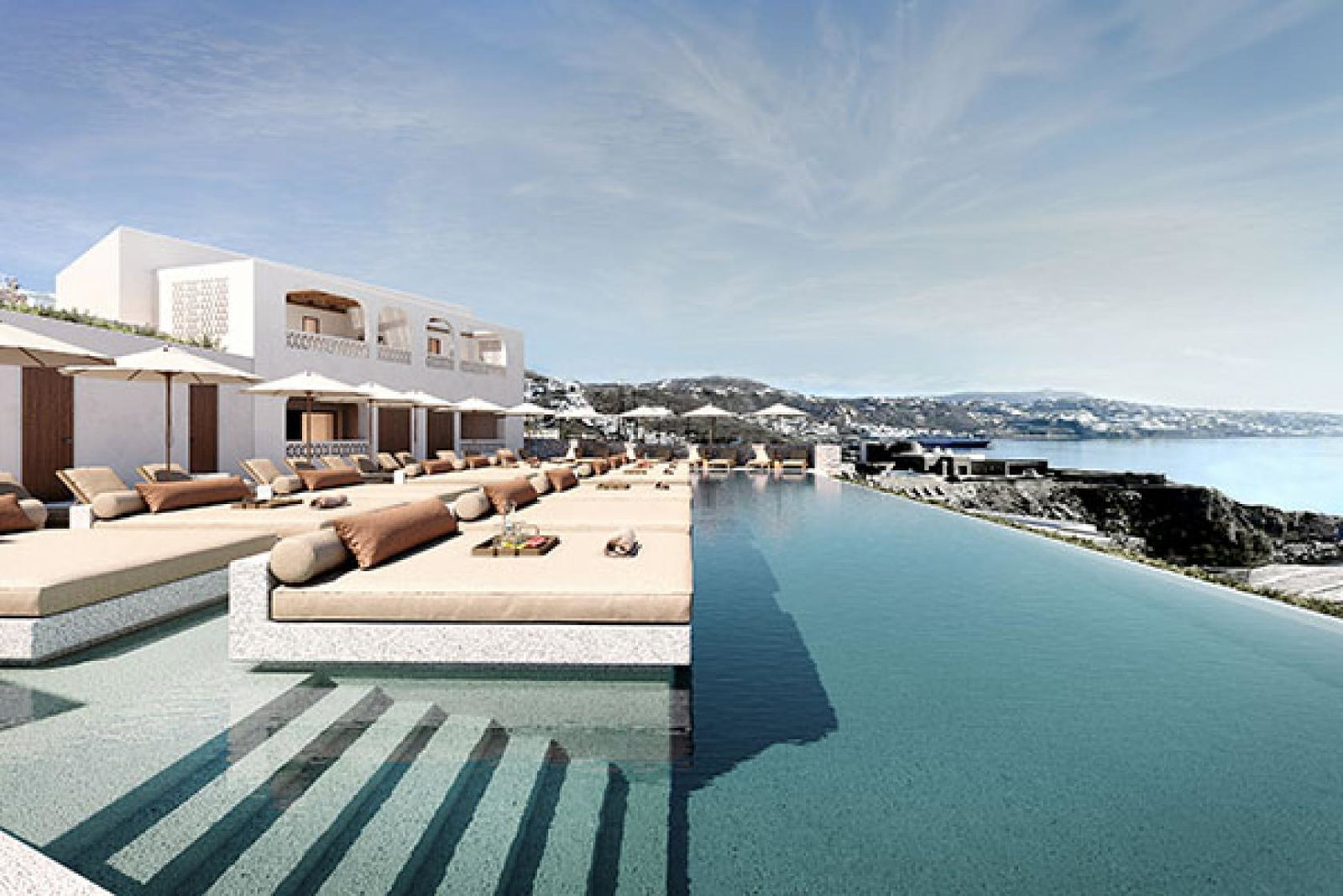 Guests can relax at the pool, looking out across the Aegean Sea