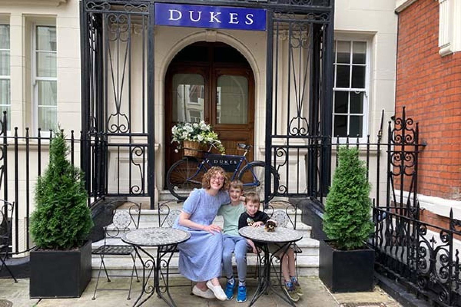 TTG Luxury's Charlotte and her sons outside Dukes London