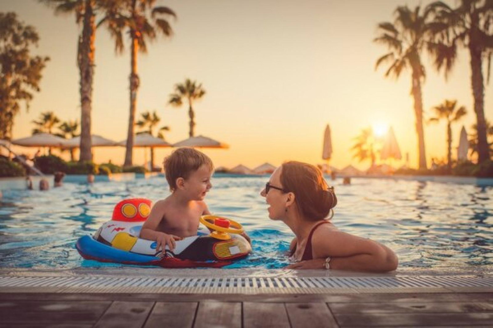 Family_Mum_Son_Pool_All-Inclusive_iStock-1136247293.jpg