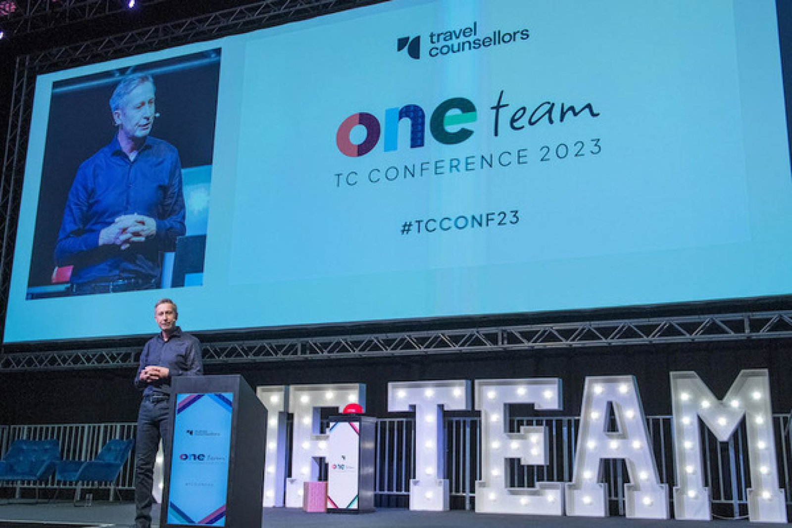 Travel Counsellors boss Steve Byrne on stage